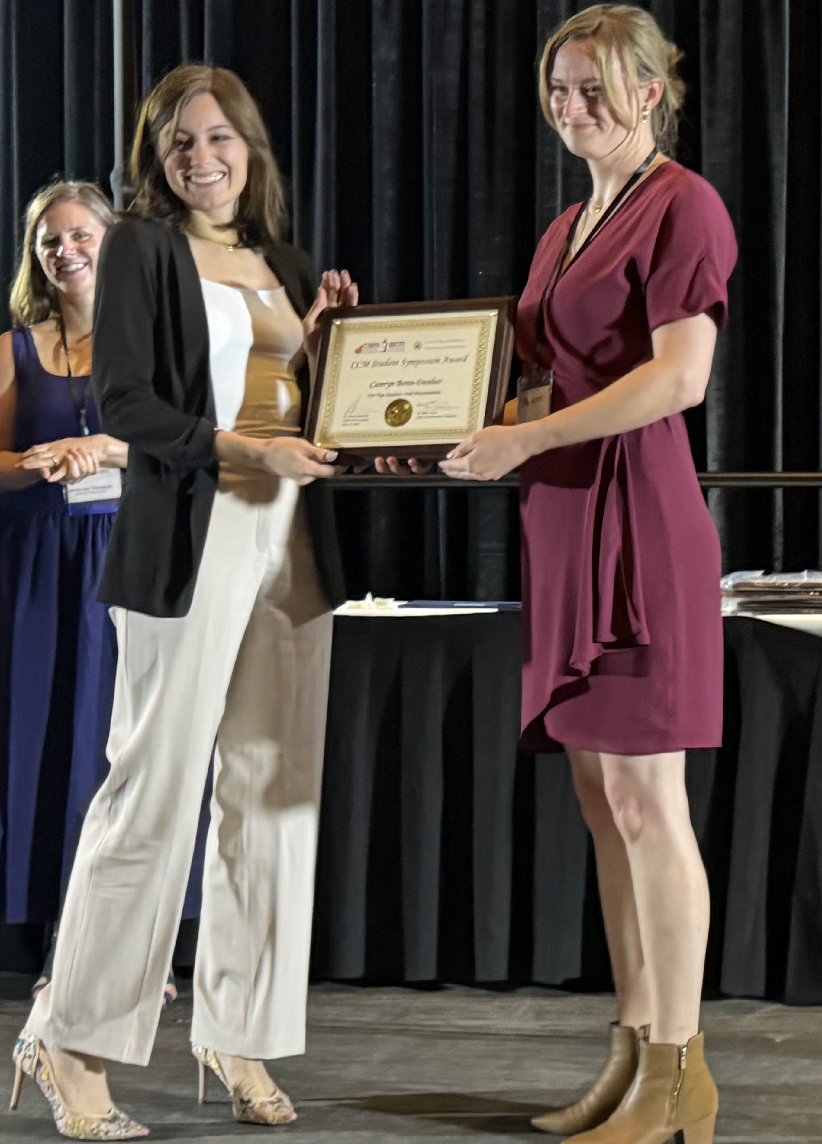 Camryn Bonn-Dunbar receiving the Top Speaker Award at CSM 2026